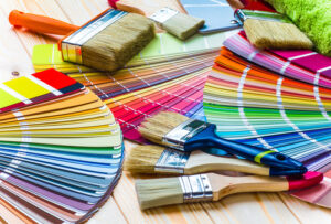 Painter,And,Decorator,Work,Table,With,House,Project,,Color,Swatches, interior painting color swatches, painting roller and paint brushes