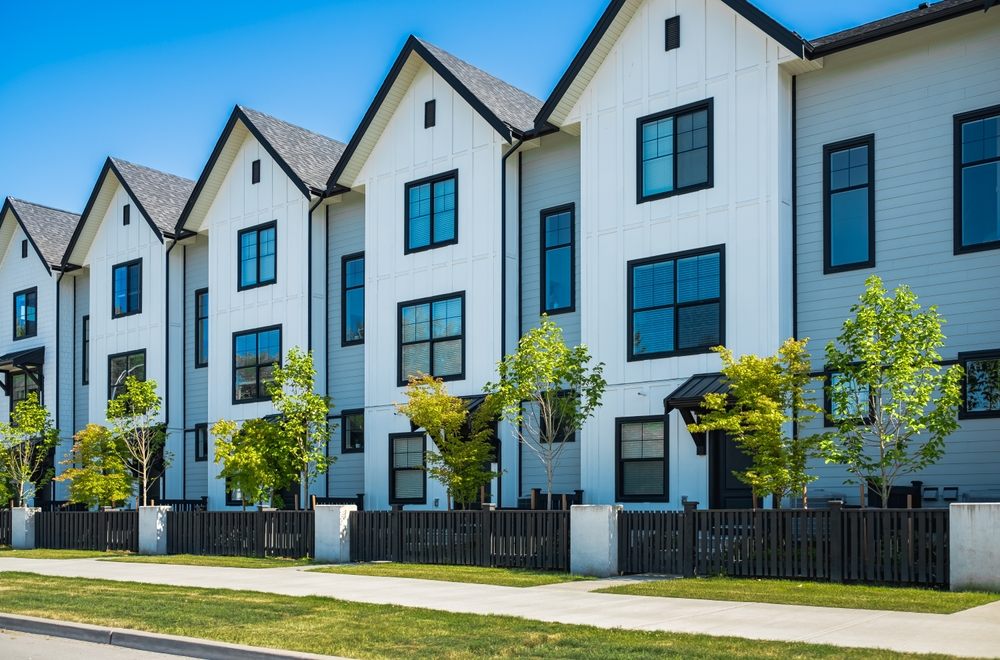 Why Choose Islanders' Choice for Strata Painting in Victoria? townhouses. multi apartment building complex freshly painted in Vancouver, BC.